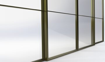 Stalen schuifdeuren met paneel onderkoker Stalen schuifdeuren met paneel onderkoker